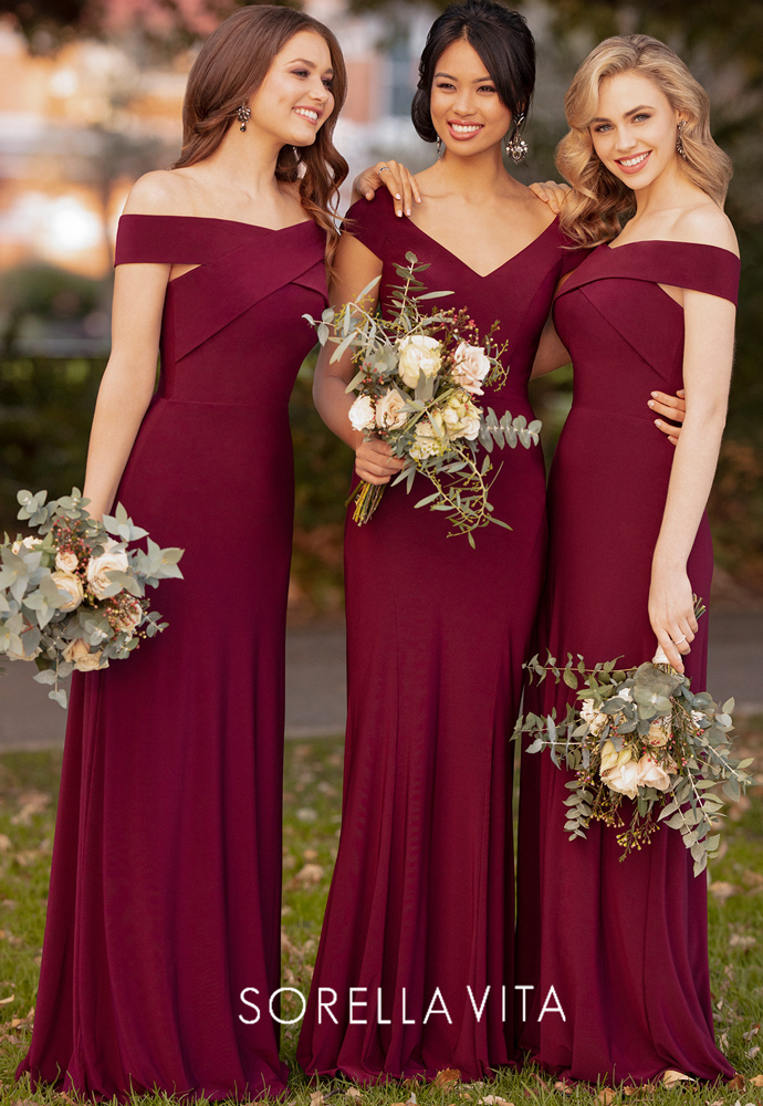 3 bridesmaids wearing burgundy dresses