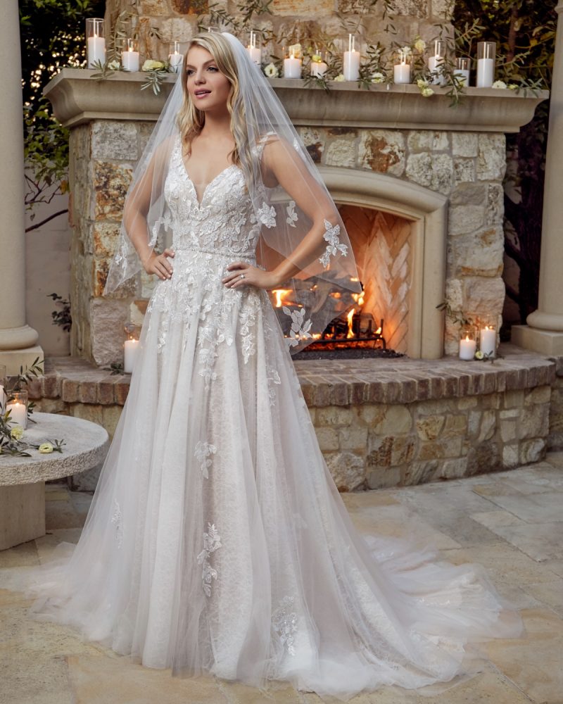 Classic sleeveless A-line bridal gown with veil