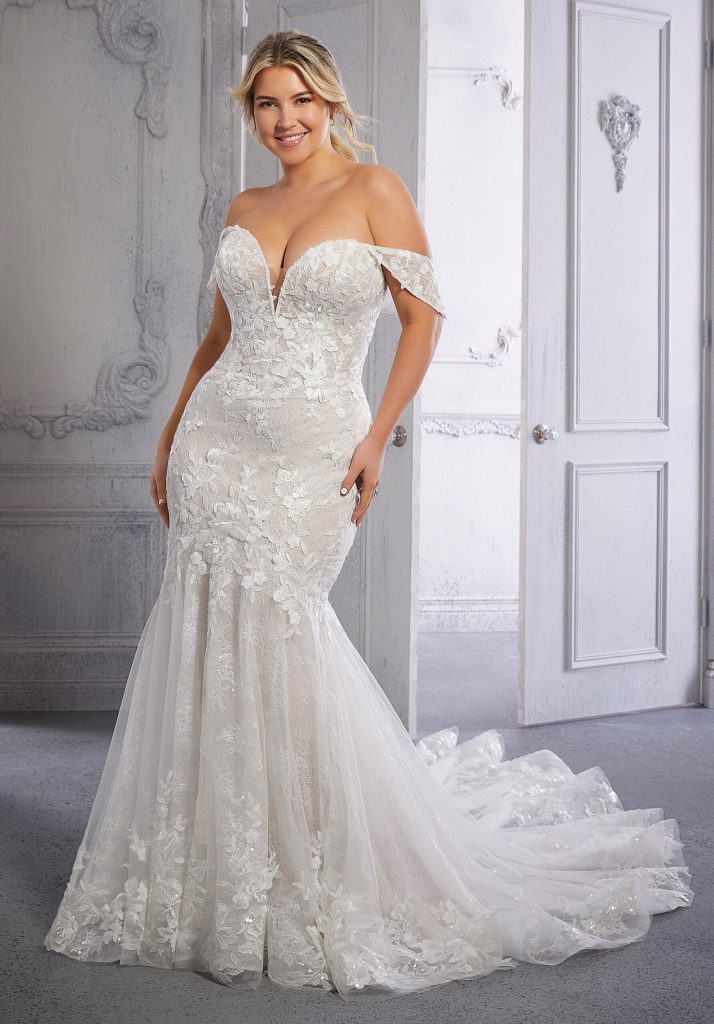 Off-the-shoulder plus-size lace fit and flare wedding dress