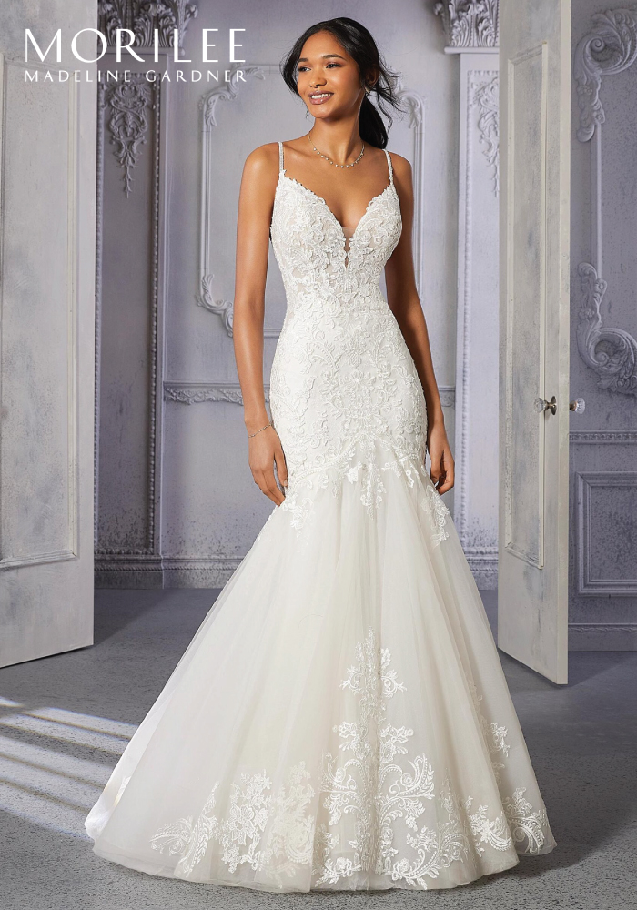 Sleeveless lace fit and flare wedding dress