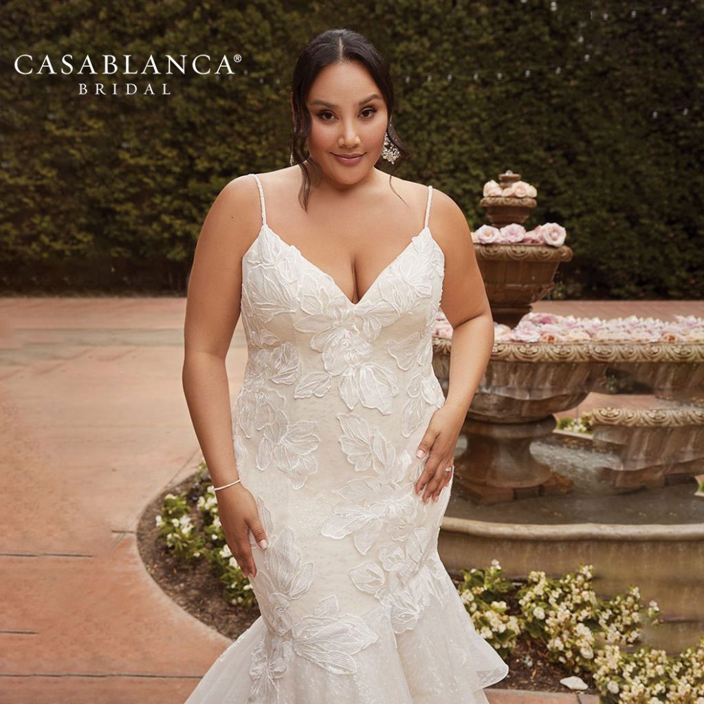 Plus-size sleeveles fit and flare bridal gown