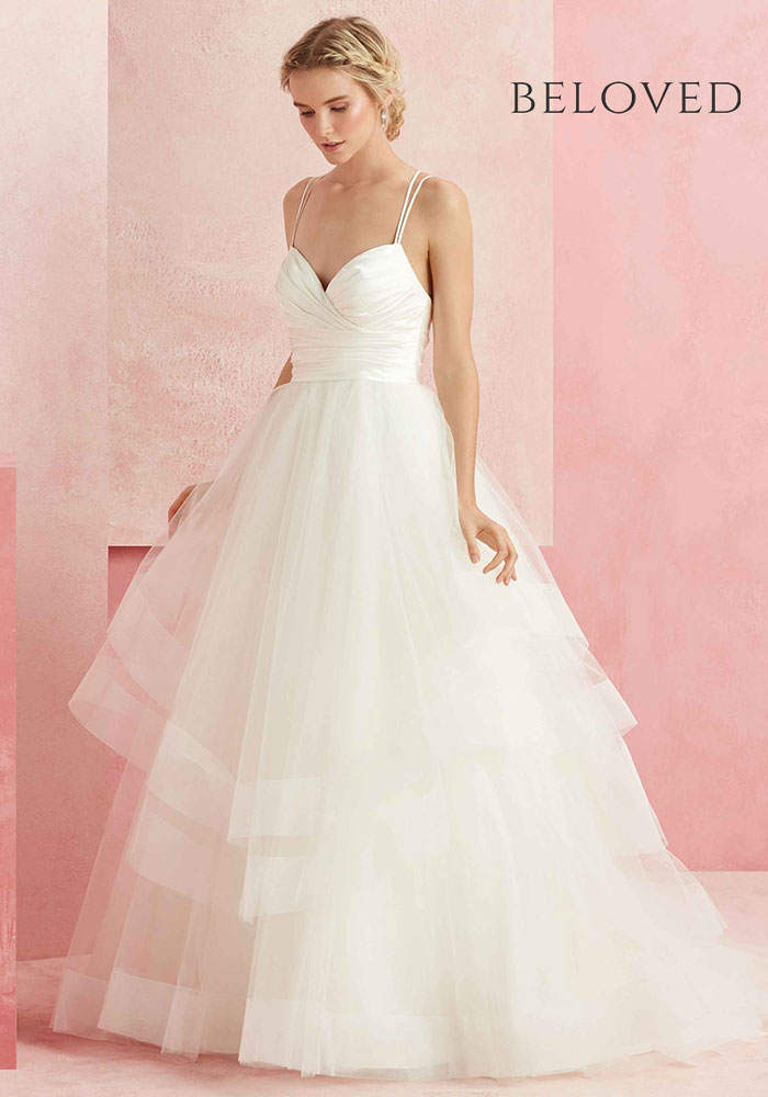 Beautiful sleeveless ballgown wedding dress with tiered skirt