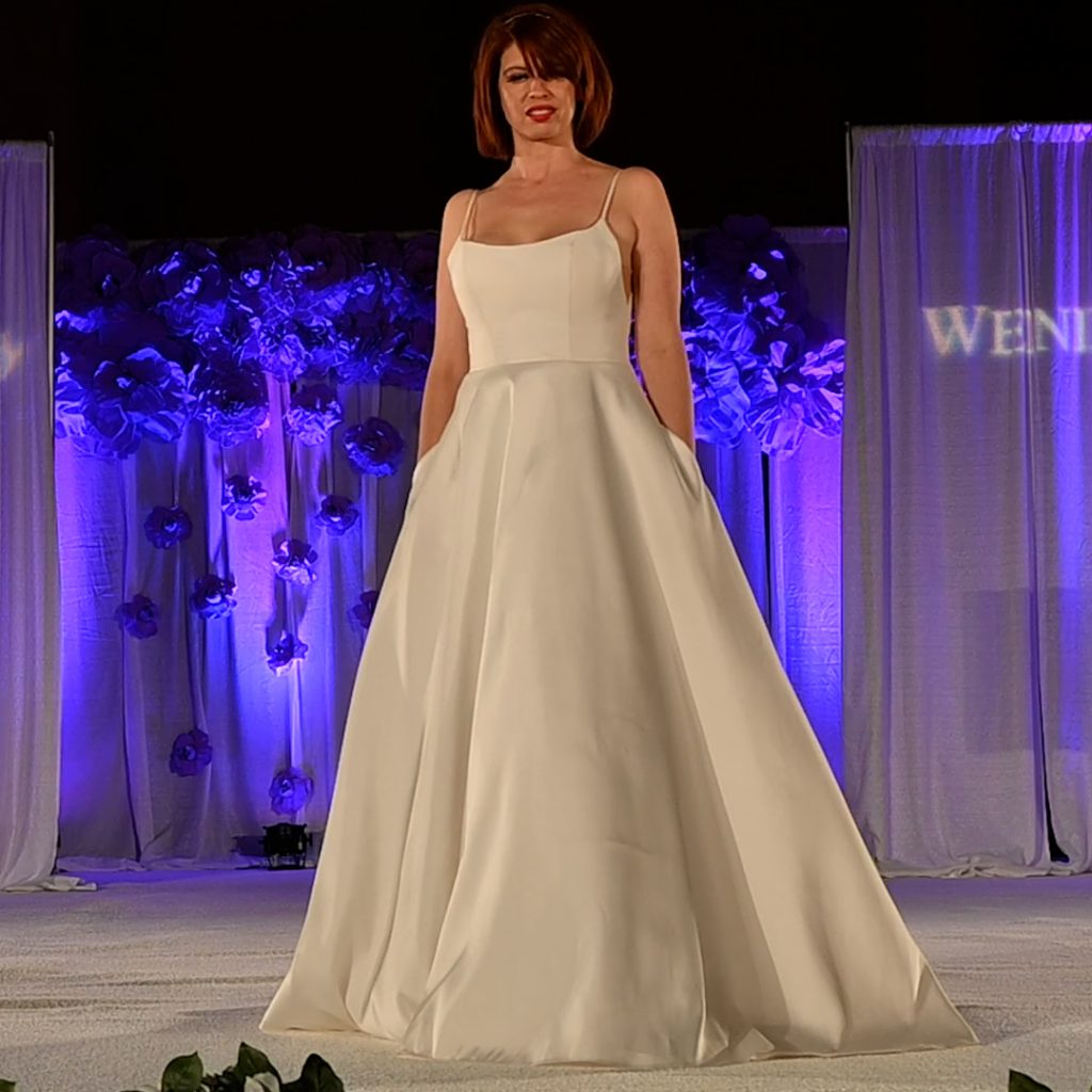 Simple sleeveless A-line bridal gown with pockets