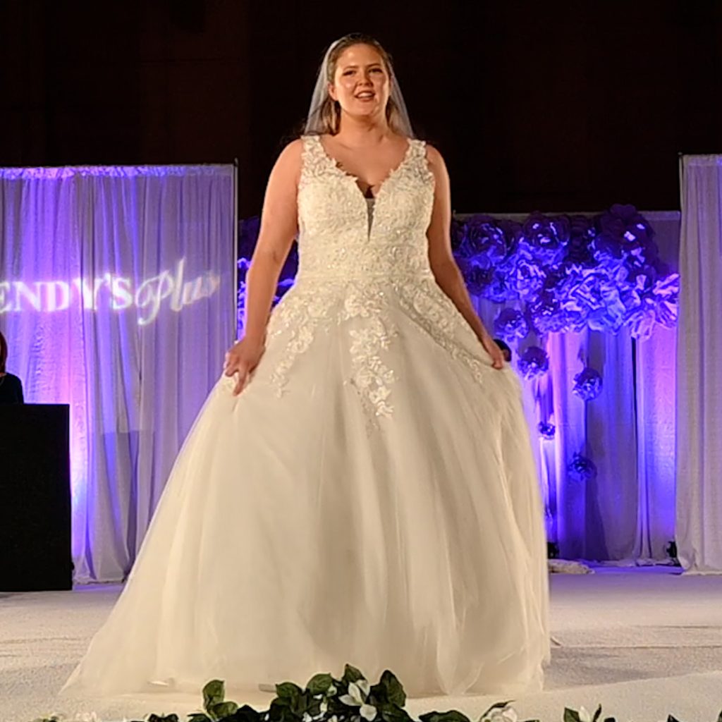 Plus-Size sleeveless A-line bridal gown with veil