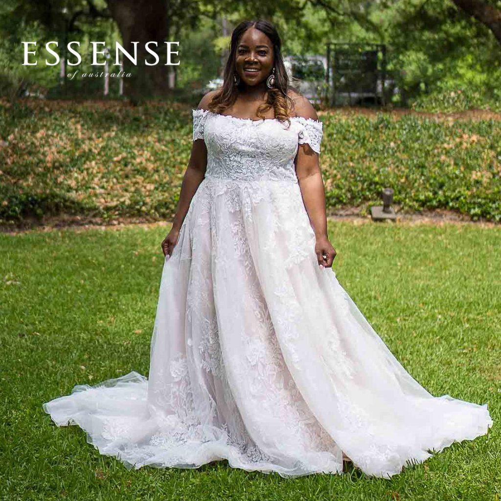 Plus-size lace A-line bridal gown with off-the-shoulder cap sleeves