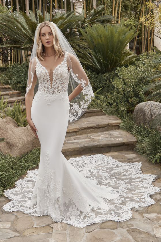 Sleeveless fit-and-flare wedding dress with veil