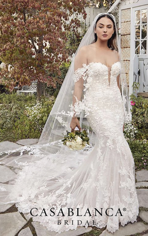 Off-the-shoulder fit-and-flare wedding dress with veil