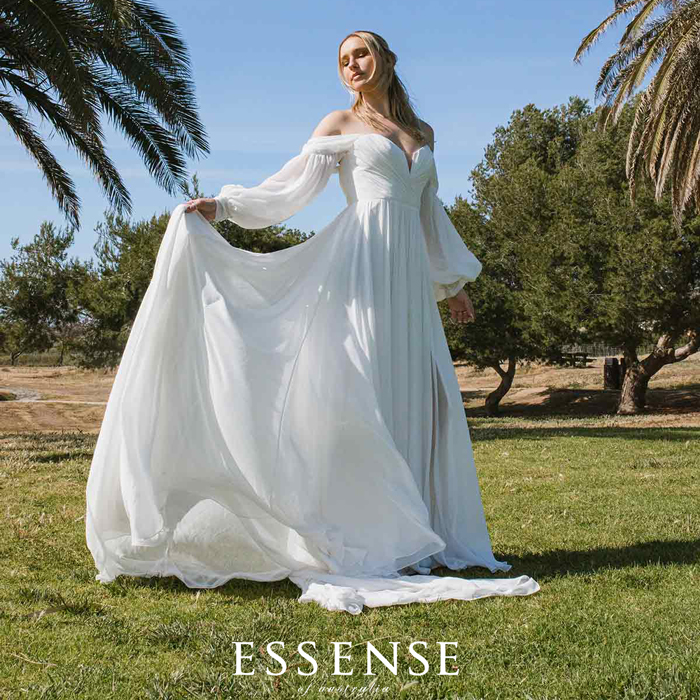 Off-the-shoulder A-line wedding dress with long sleeves