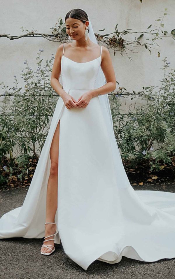 Sleeveless A-line bridal gown with sexy leg slit
