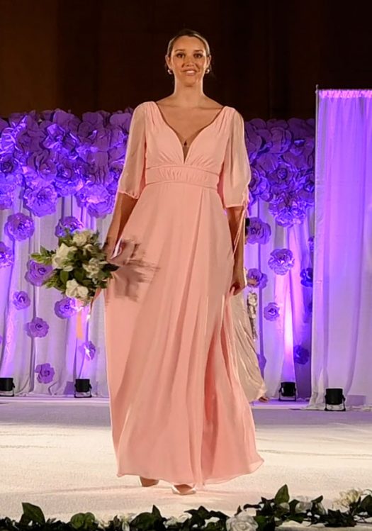 Peach-color bridesmaids dress with 3/4 length sleeves