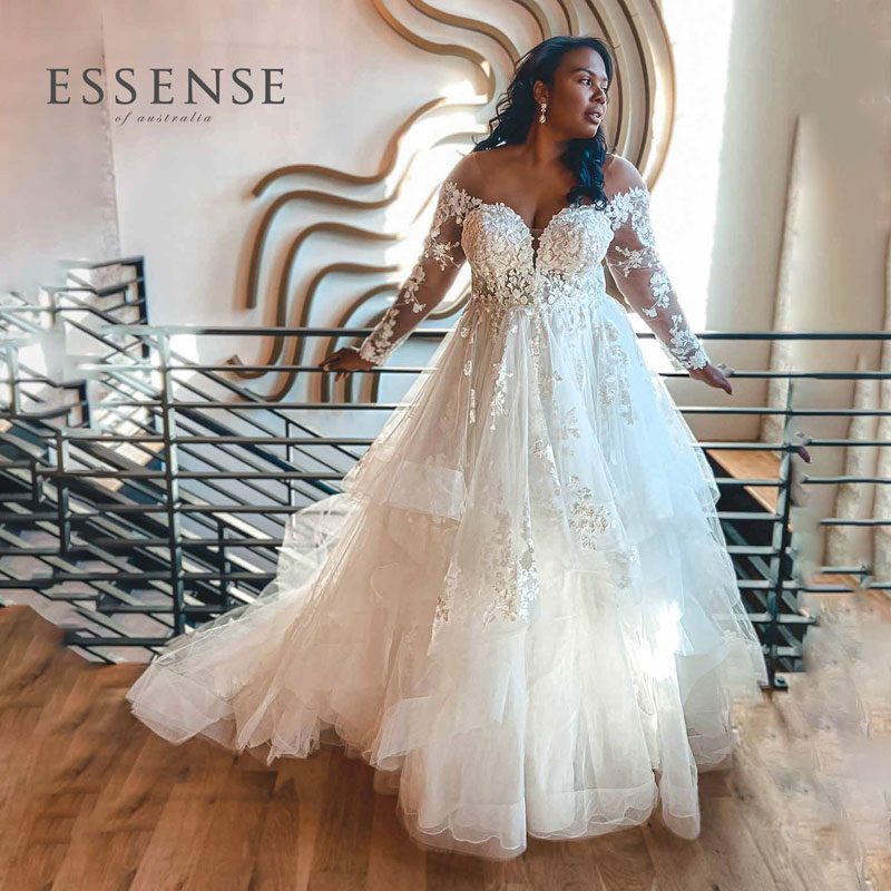 Plus-Size ballgown wedding dress with long lace sleeve, from Essense of Australis