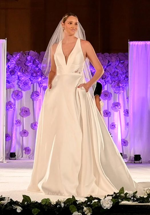 Simple sleeveless A-line bridal gown with veil